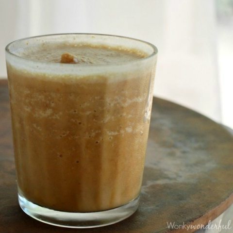 clear glass filled with creamy light brown drink