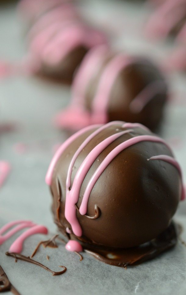 chocolate ball with pink cant drizzle on top