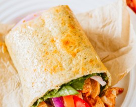 light golden flat bread rolled into wrap