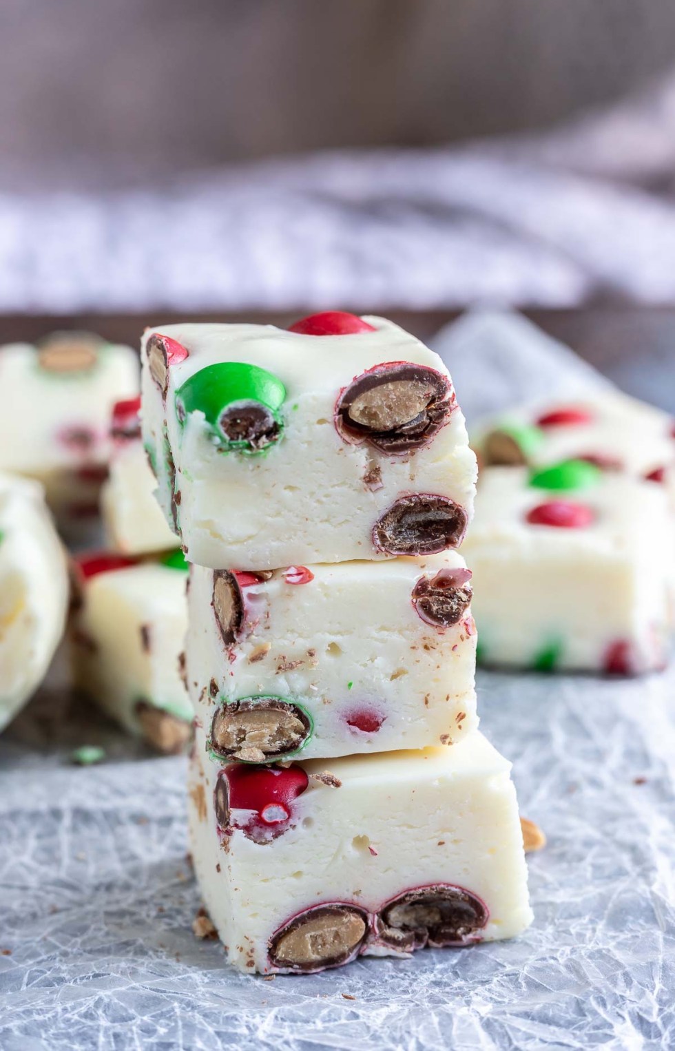 stacked white fudge with candy pieces inside