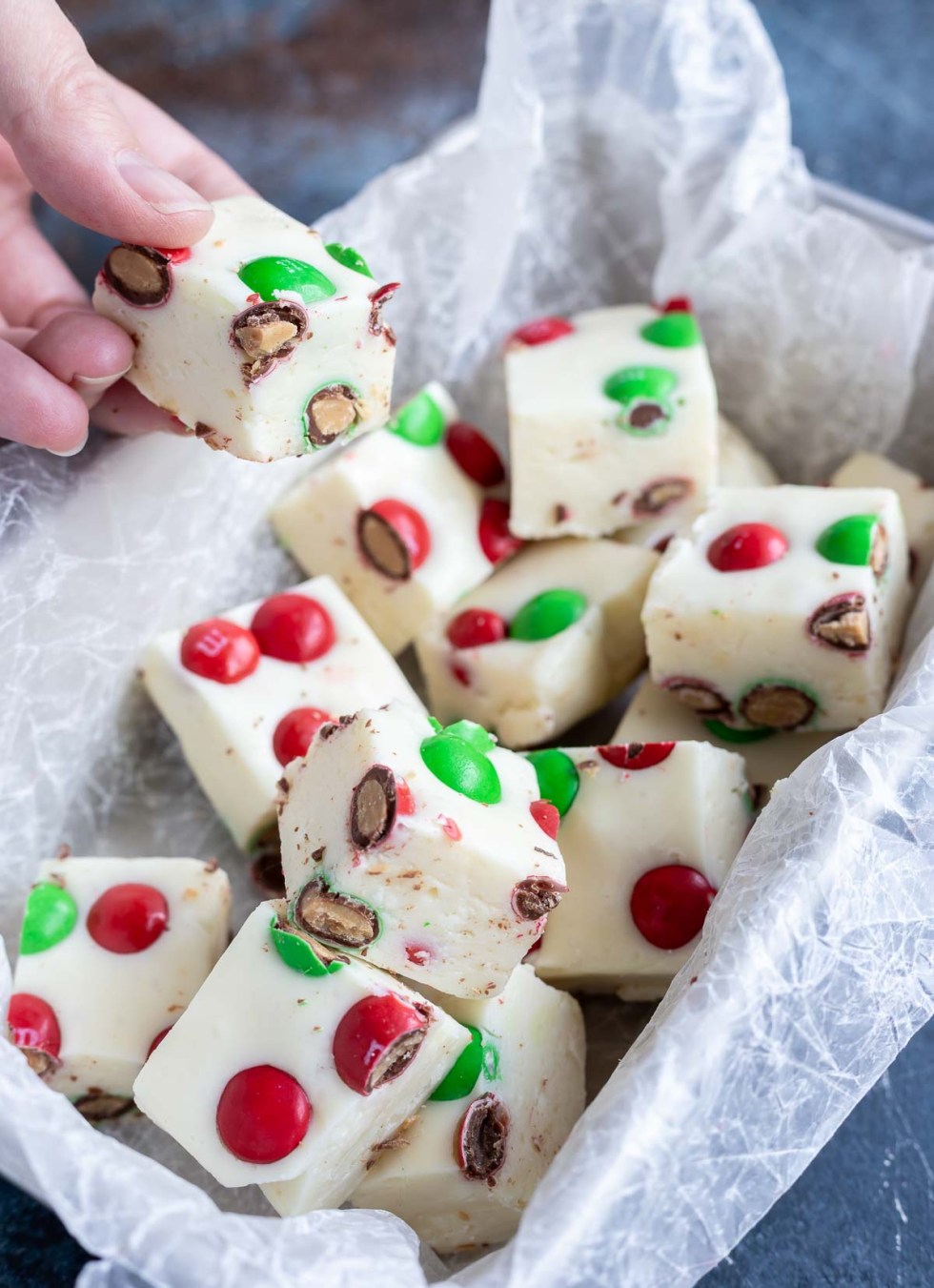 hand grabbing fudge square