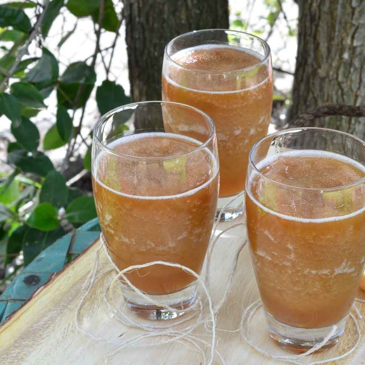 Celebrate the return of Spring and Summer with this Frozen Apple Daiquiri Recipe! A unique twist on a favorite summertime cocktail. Apple, rum and amaretto come together in this super refreshing drink! CHEERS!