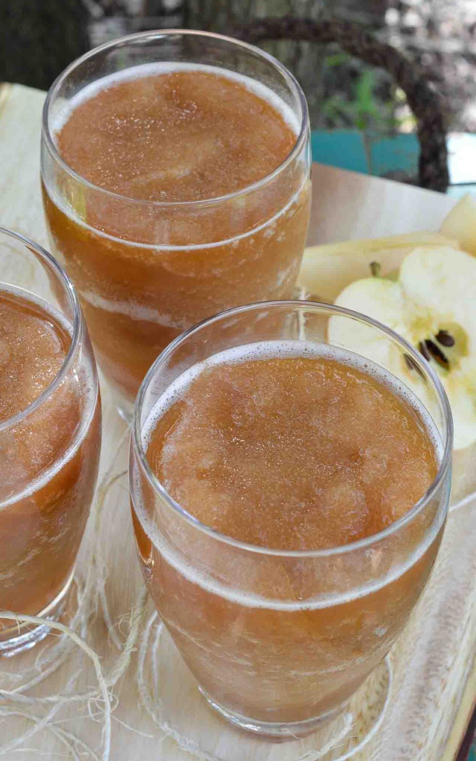 Celebrate the return of Spring and Summer with this Frozen Apple Daiquiri Recipe! A unique twist on a favorite summertime cocktail. Apple, rum and amaretto come together in this super refreshing drink! CHEERS!