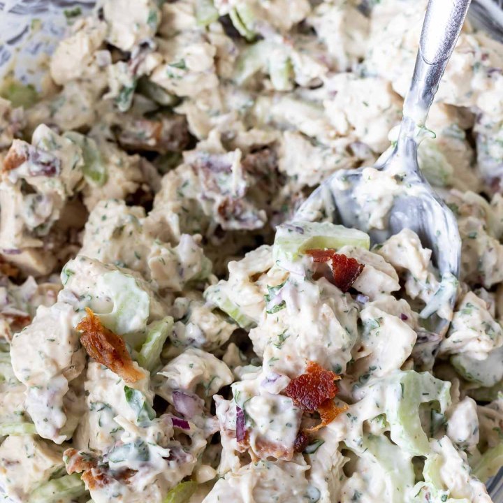 mixed chicken salad in clear glass bowl