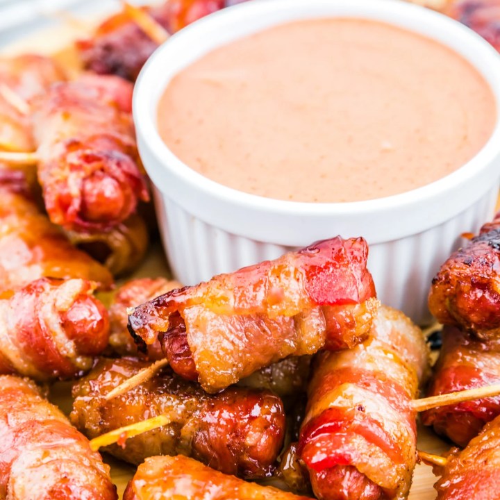 prepared smokies in bacon served with spicy mayo dip