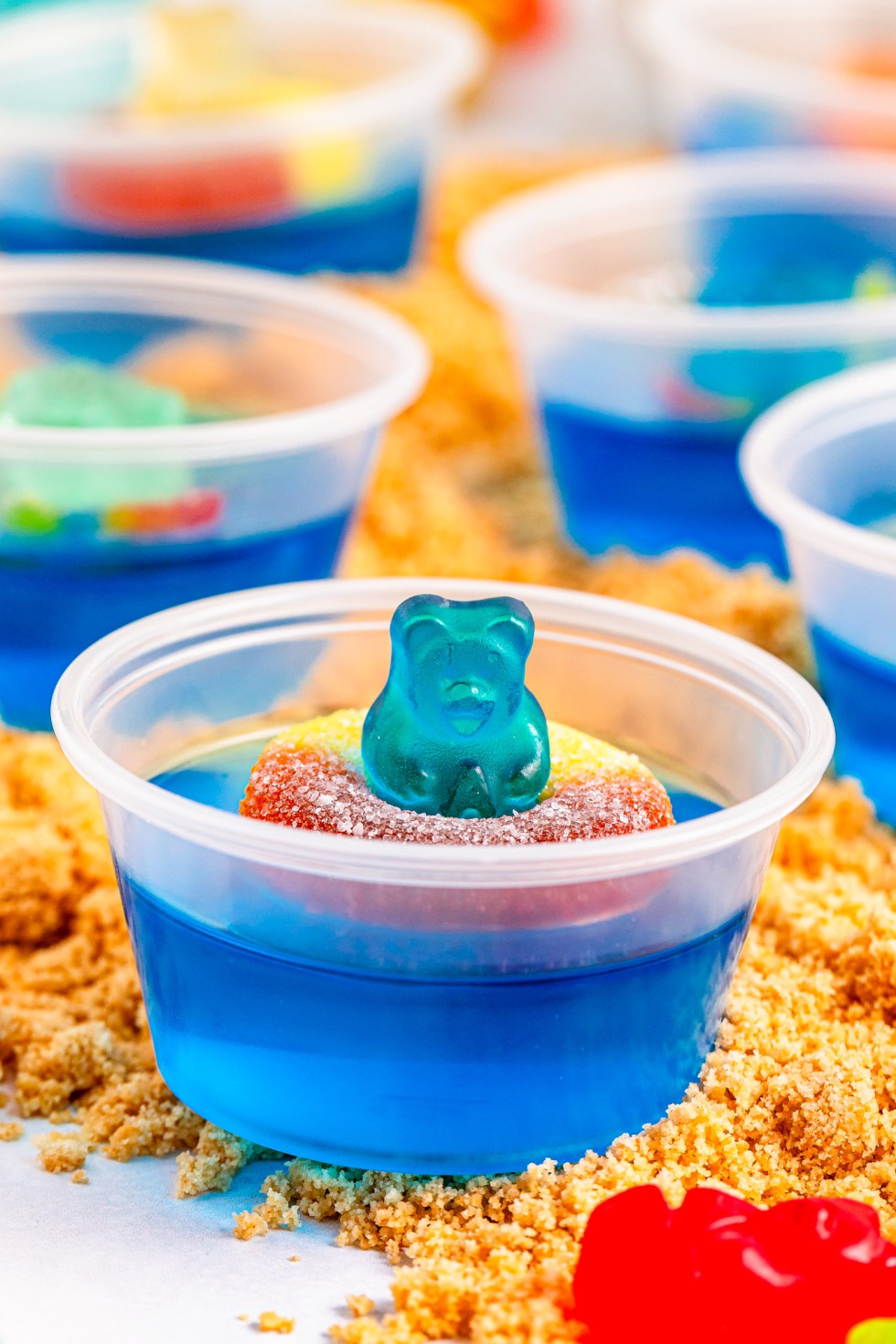 blue gummy bear in gummy ring