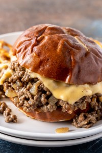 loose meat and cheese sauce served on pretzel roll