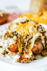 loaded baked potato topped with pickles