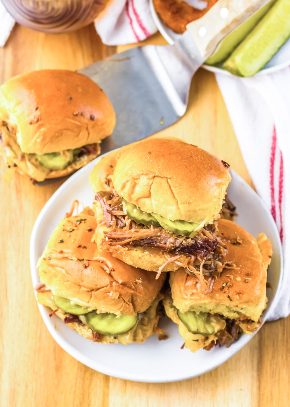 beef sliders on white plate