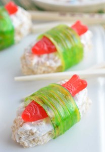 The kids will go crazy for this Candy Sushi! Made with rice crispy treats, Swedish fish candy and fruit roll ups. This dessert sushi recipe is easy to make, portable and great for parties.