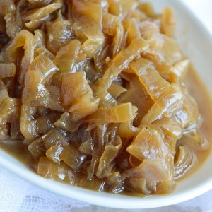 This Slow Cooker Caramelized Onions Recipe is the easy way to make sweet golden brown onions. Just load up your crockpot with onions, set it and forget it!