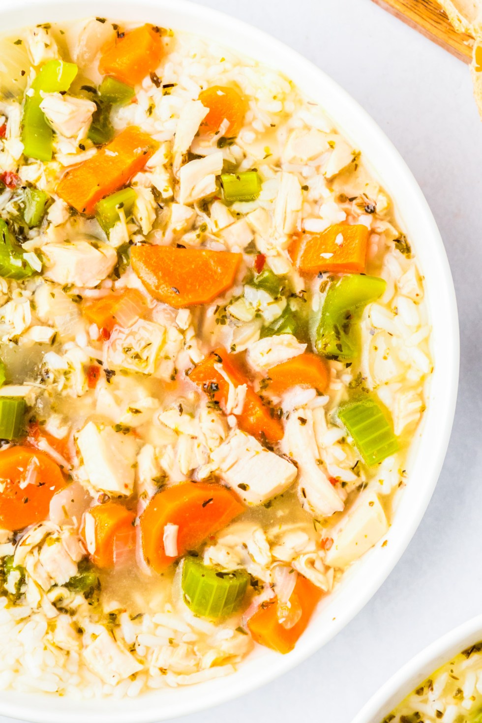 chicken veggies and rice in bowl