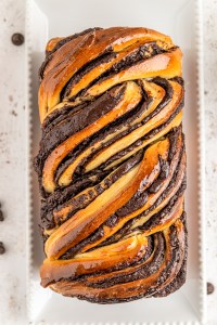 golden baked bread loaf with streaks of chocolate brown