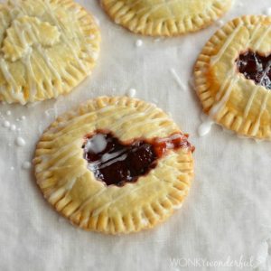 mini hand pies with heart shaped cut out on top