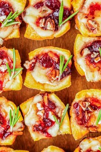 baked brie bites on wooden board