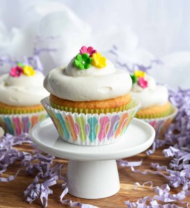 This Vanilla Cream Cheese Frosting Recipe is perfect for just about any cake. Cream cheese whipped into buttercream icing and flavored with vanilla. Make these Spring cupcakes for a tasty Easter treat!