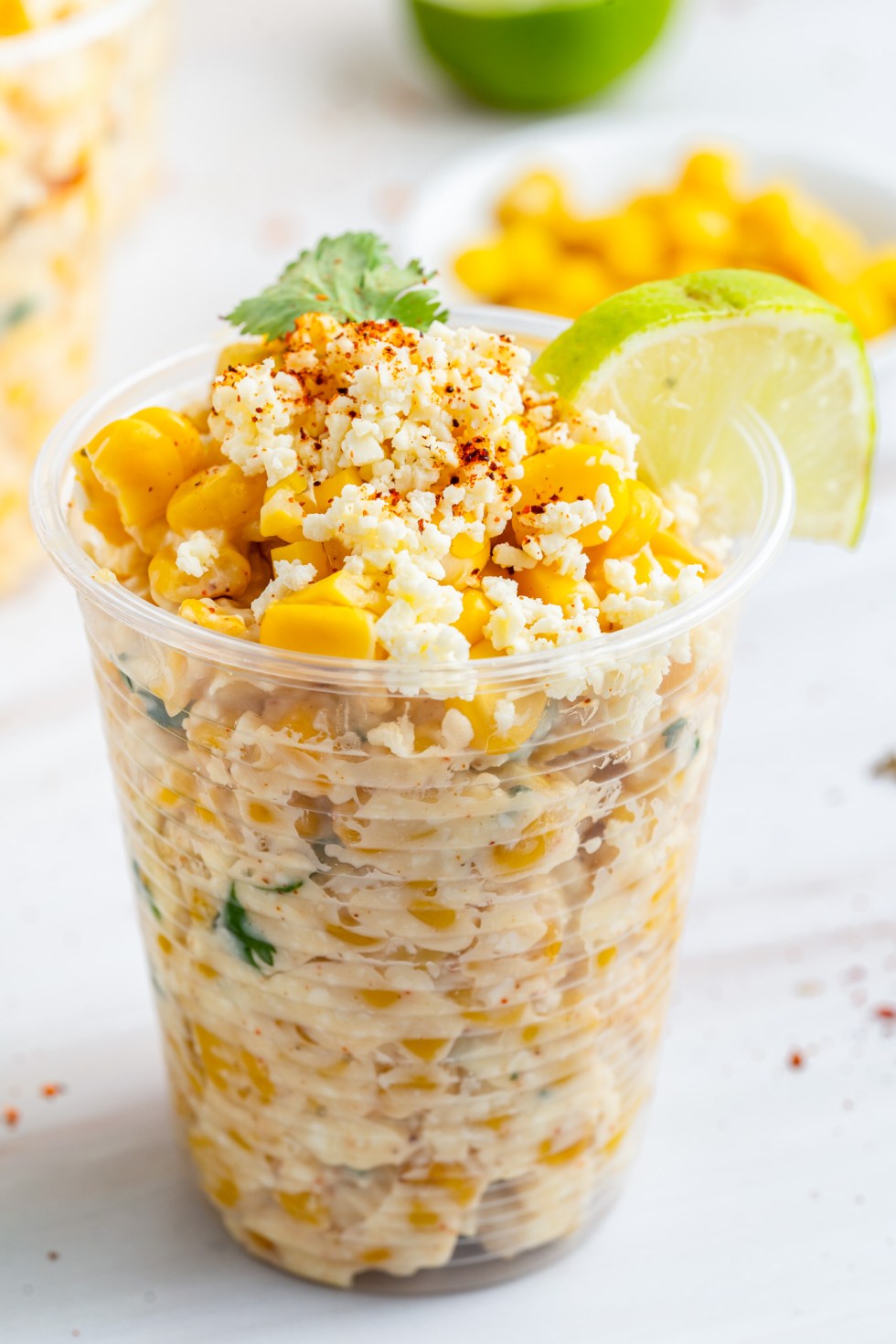 prepared corn in clear plastic cup