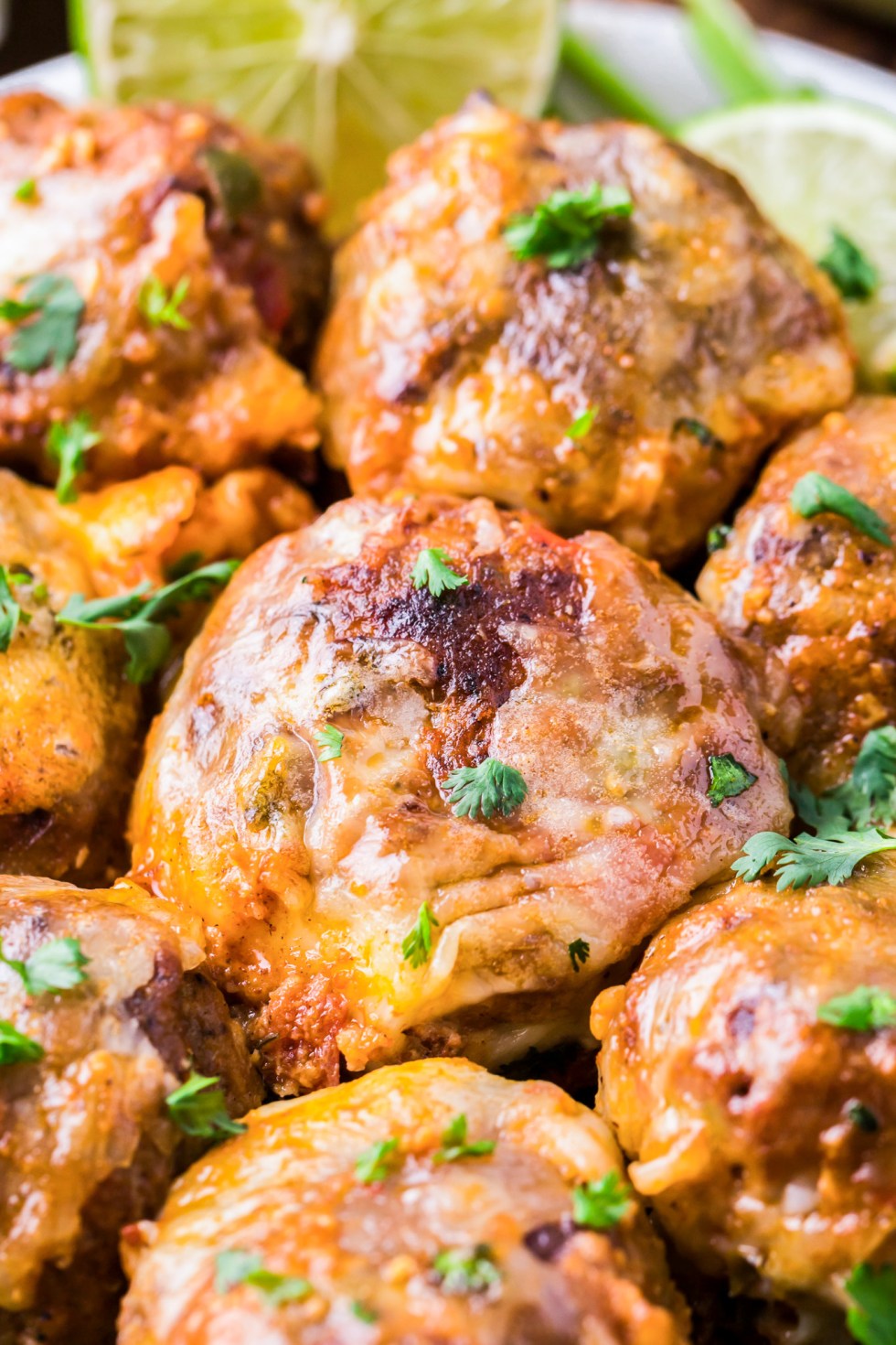 prepared meatballs covered with sauce and cheese