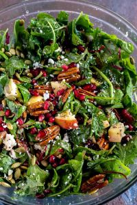 prepared salad in clear glass bowl