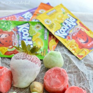 packets of kool-aid next to frozen fruit bites