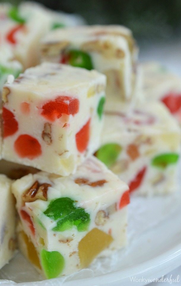 white fudge filled with red and green candied cherries and nuts cut into squares