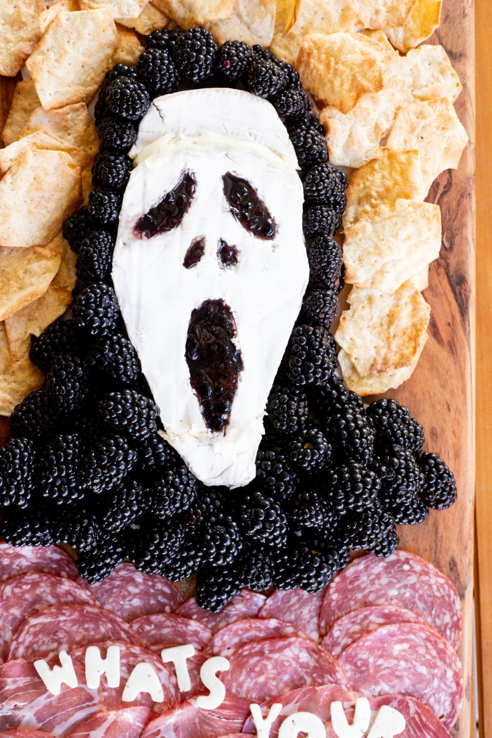 brie and blackberries made to look like movie villain