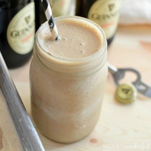 glass mason jar filled with creamy milkshake drink