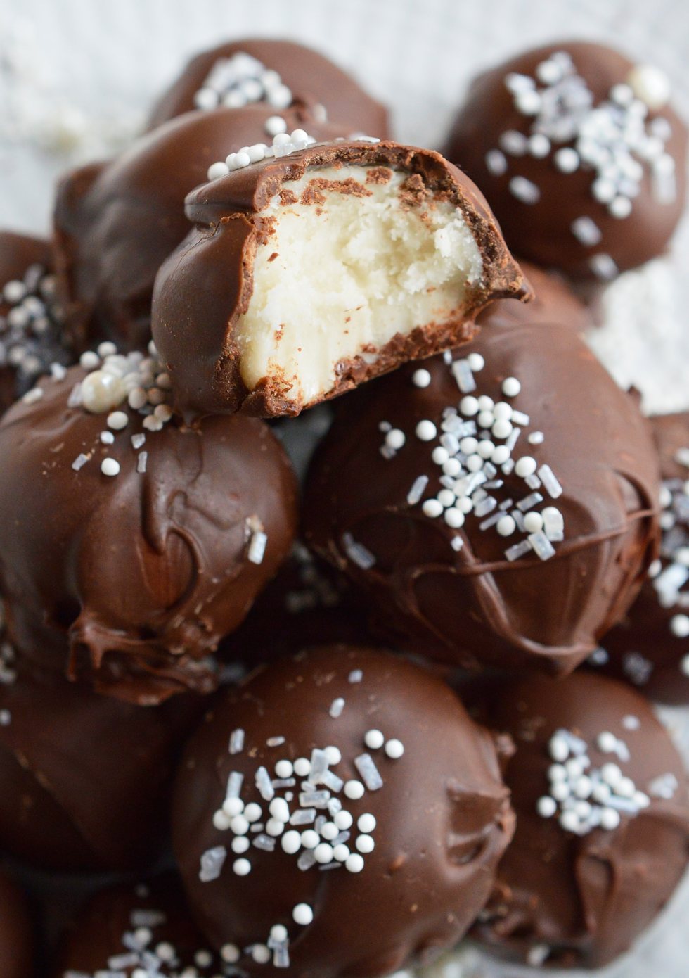 It's time for holiday treat platters and homemade gifts. These No-Bake Peppermint Pattie Chocolate Truffles will be the star of any Christmas dessert tray! Cool peppermint filling is shaped into balls and coated with chocolate then topped with sprinkles.