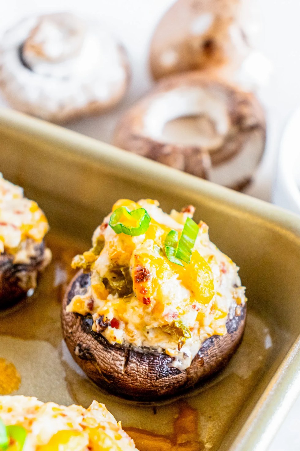 stuffed mushroom on baking sheet