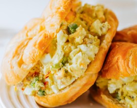 egg salad in flaky croissants