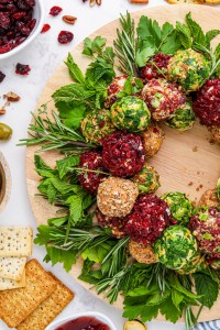 green red and tan cheeballs arranged on wooden board