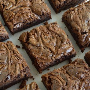 This Chocolate Chunk Nutella Brownies Recipe is an easy and delicious chocolate dessert! Fudgy brownies packed full of chocolate chunks then topped with a Nutella swirl. Perfect for potlucks, picnics or just because!