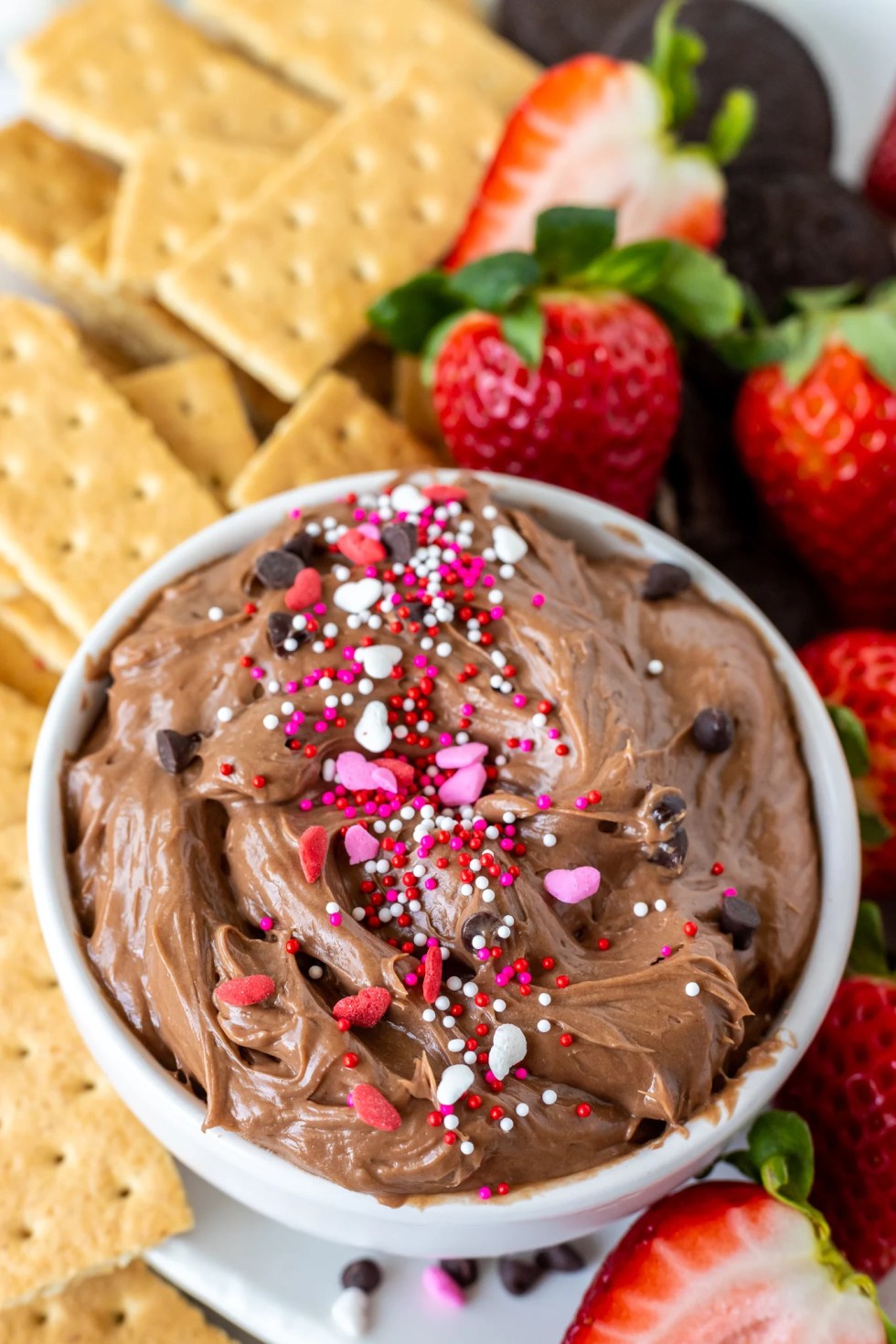 brown dip topped with valentine sprinkles