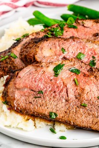 tri tip slices on mashed potatoes