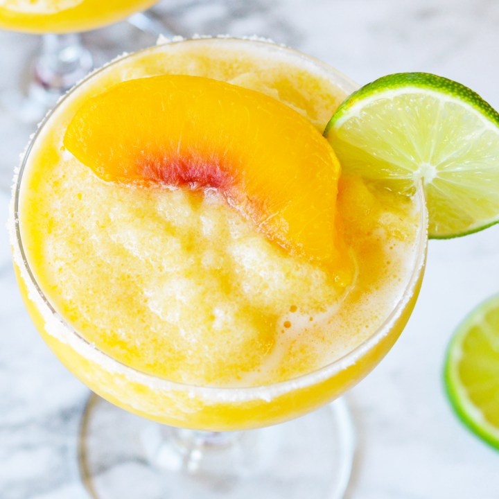 slushy peach drink in glass