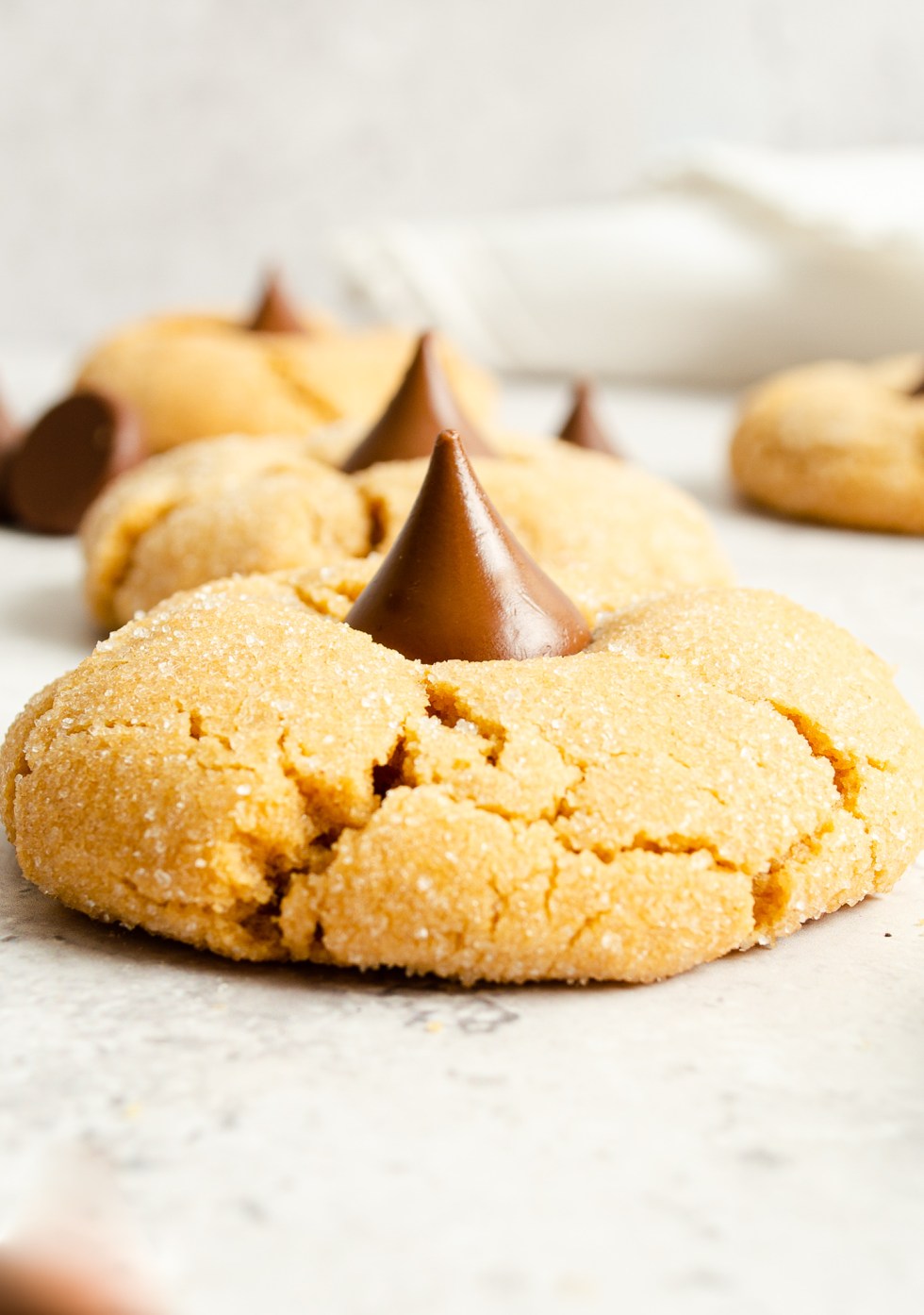 baked peanut butter cookie topped with chocolate candy