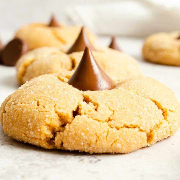 baked peanut butter cookie topped with chocolate candy