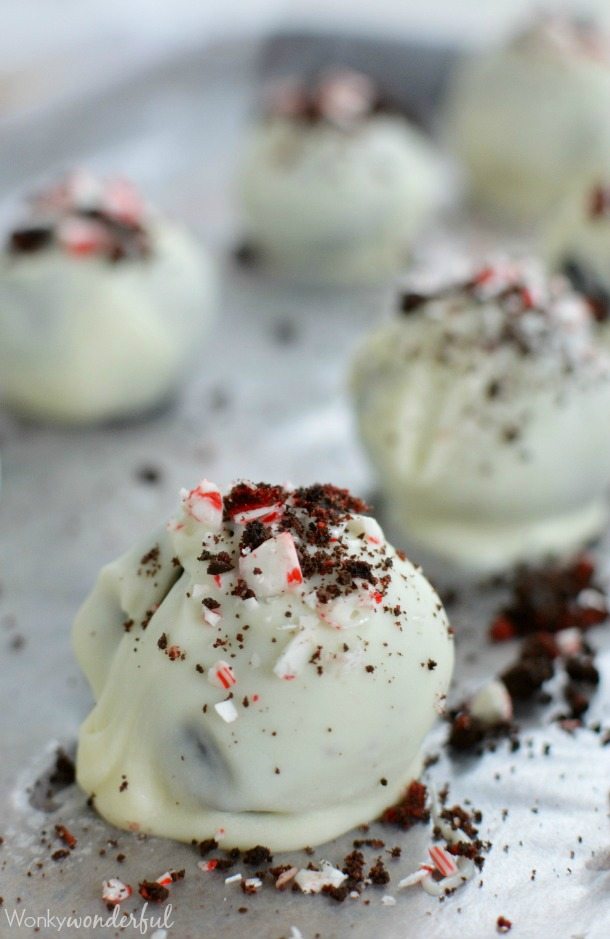 white chocolate covered balls on baking sheet