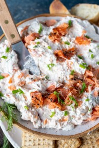 dip topped with smoked salmon and dill