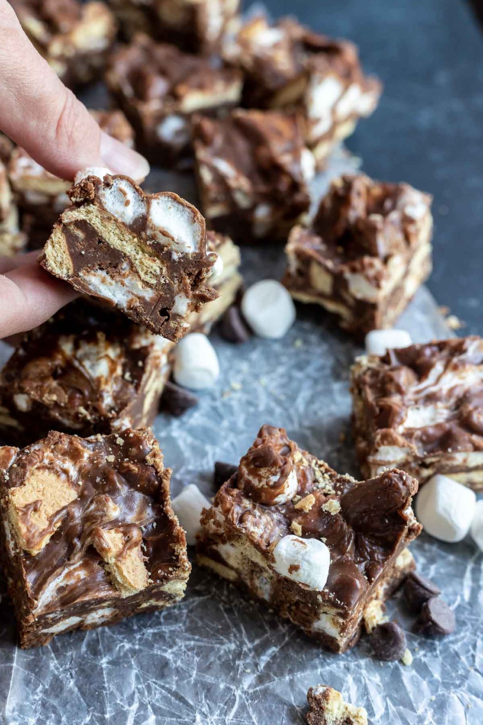 hand grabbing piece of fudge