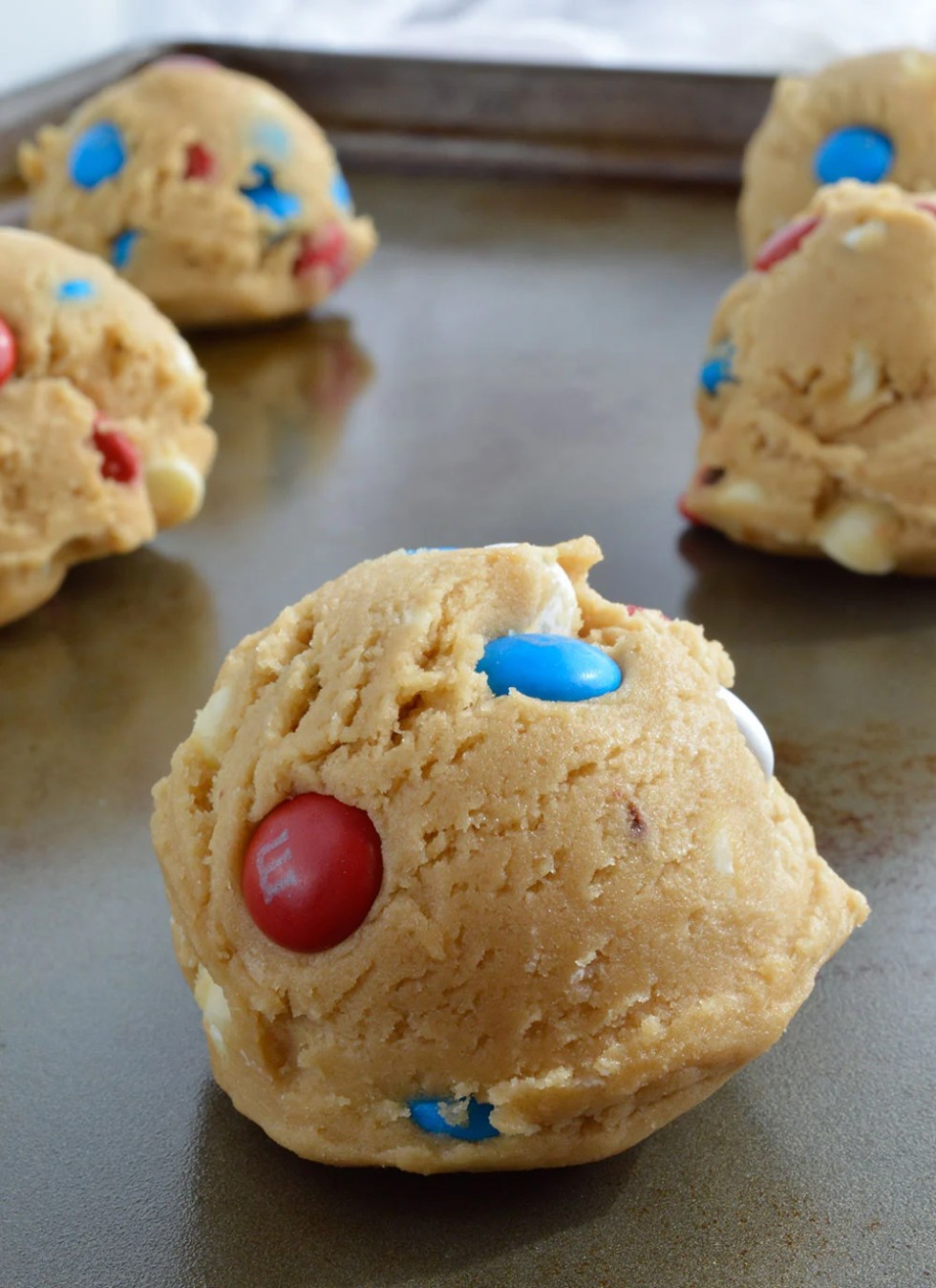 Soft Chocolate Chip Cookies Recipe with M&M's and white chocolate chips. These soft batch cookies are moist, chewy and loaded with Red White and Blue M&M's!