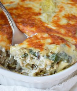 Spinach Artichoke Wild Rice Casserole is perfect for those busy weeknights. This family dinner recipe is nutritious and full of flavor!