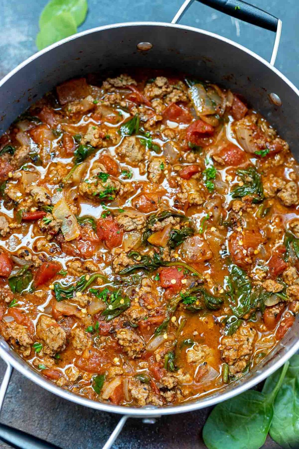 chunky tomato sauce in pot with handles