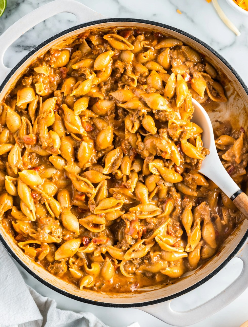 pasta in skillet with serving spoon