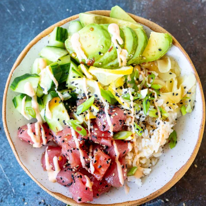 prepared tuna poke served in white speckled bowl