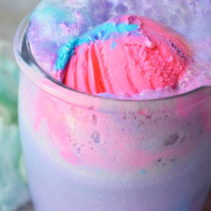 Get the party started with this Cotton Candy Unicorn Party Punch and Unicorn Ice Cream Cake! The punch recipe is made simply with 2 ingredients and the ice cream cake takes just minutes to decorate. The kids will love this fun and colorful drink!