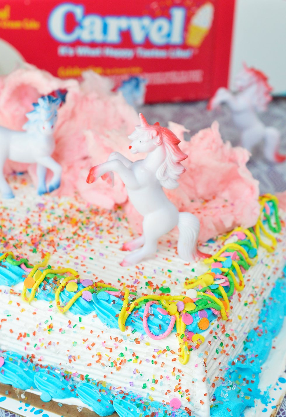 Get the party started with this Cotton Candy Unicorn Party Punch and Unicorn Ice Cream Cake! The punch recipe is made simply with 2 ingredients and the ice cream cake takes just minutes to decorate. The kids will love this fun and colorful drink!